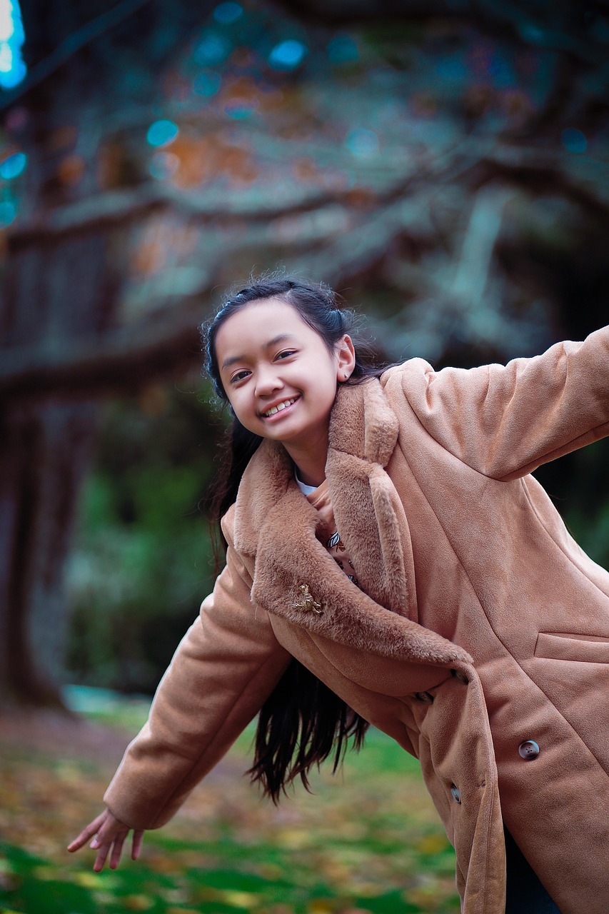 Smiling child in a coat